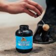Black bottle of Absorbine Supershine Clear hoof polish and sealer.